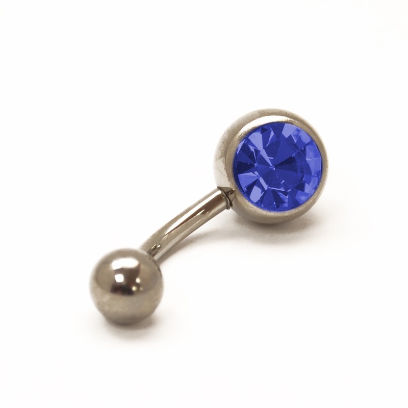 Navel de Titanio con una piedra